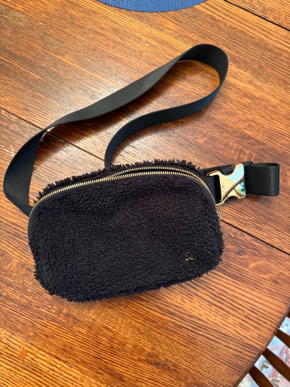 Lululemon Everywhere Belt Bag 1L in black fleece with gold hardware